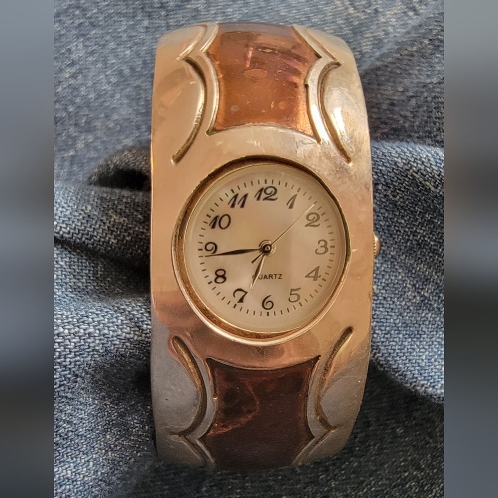 Sterling and copper bracelet watch. Works but needs battery. Marked sterling.